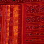Styling view of yellow and red cotton Sambalpuri saree with motifs