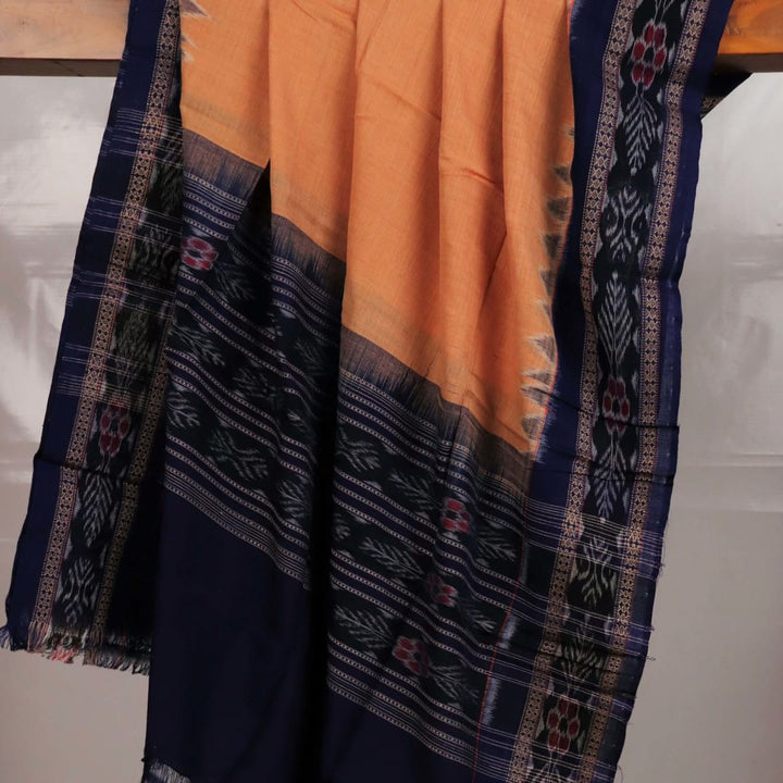 Styling view of a cream and black Sambalpuri cotton dupatta with plain pattern