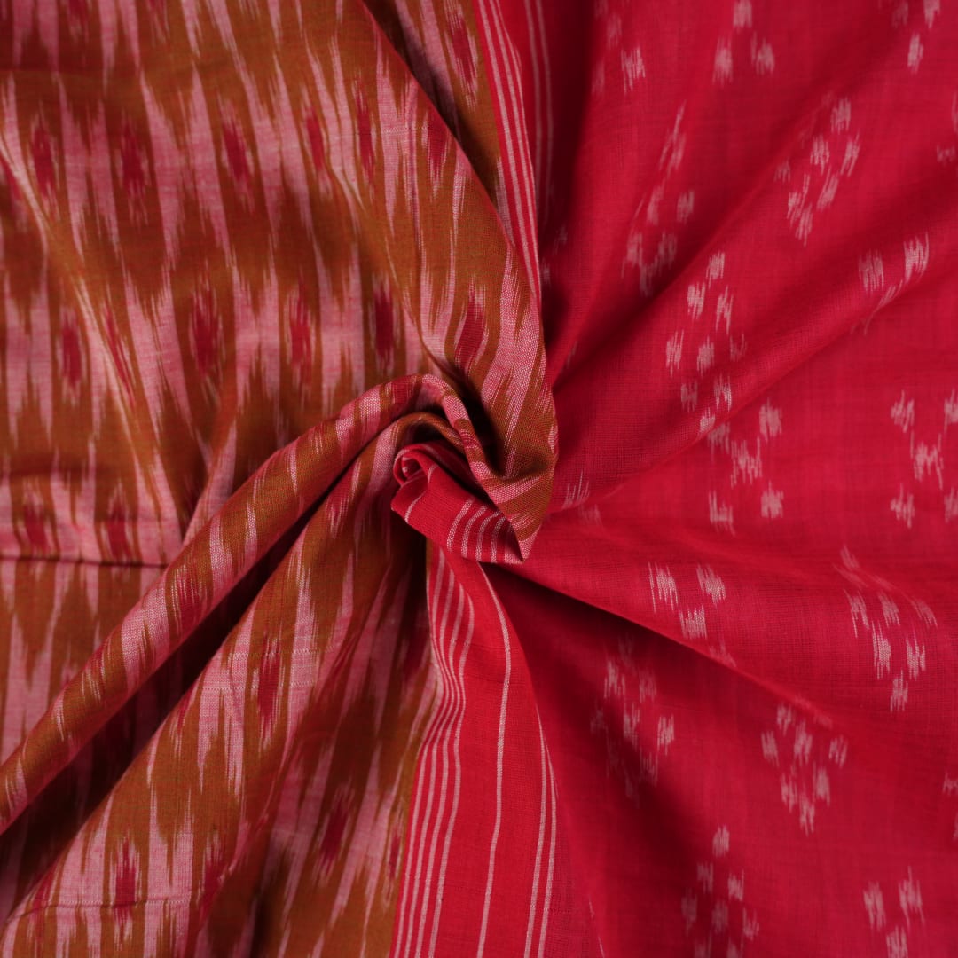 Model styled in a red multi-color Sambalpuri cotton saree featuring traditional hand-woven ikat motifs.