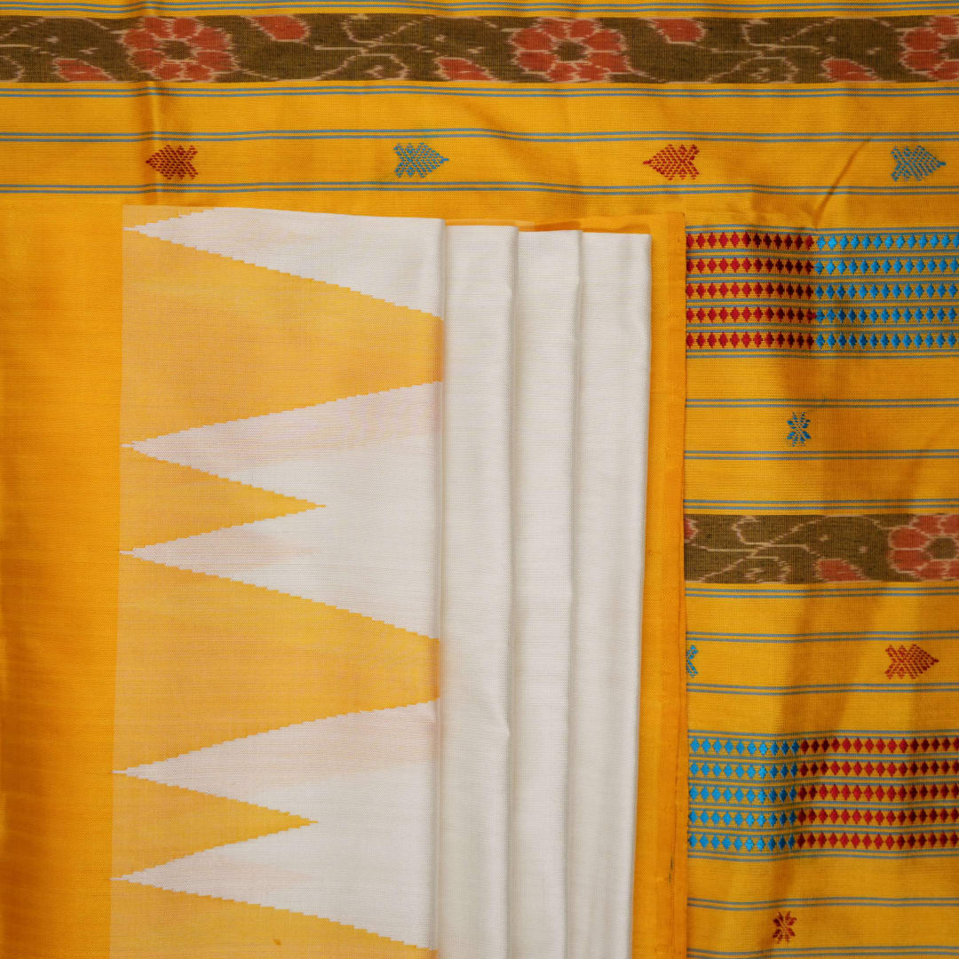 Close-up of the smooth texture and plain weave of white Sambalpuri silk fabric.