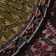 Green cotton Sambalpuri saree in styling view, showcasing motifs and draping style.