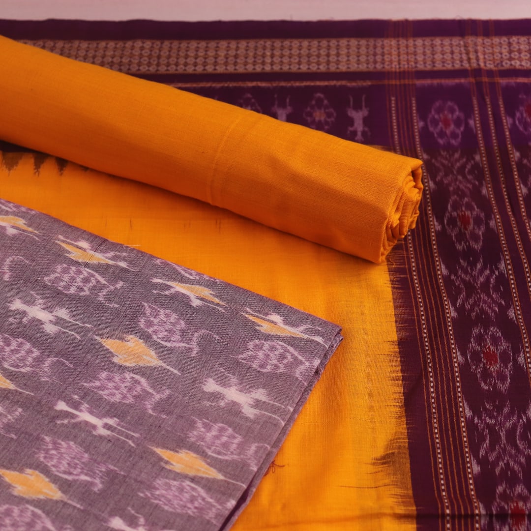 Sambalpuri cotton dress material: Multi-color and yellow motif blouse piece detail.