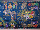 Close-up of the handwoven blue Patachitra silk saree, showcasing the detailed texture of the fabric.