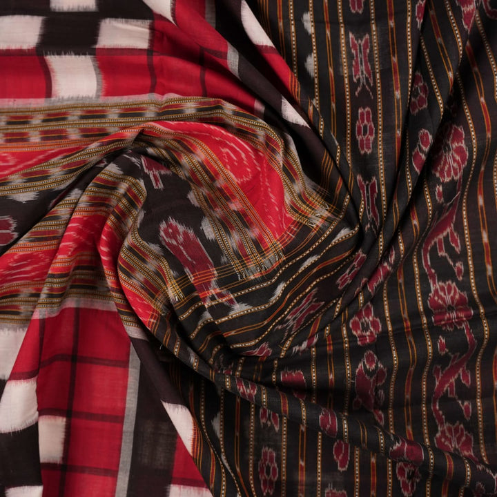 Model draped in a maroon and black pasapalli Sambalpuri cotton saree showcasing traditional Odisha style.
