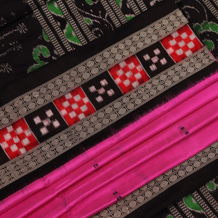 Close-up view of intricate Pasapalli pattern on a shimmering pink and black Sambalpuri silk saree