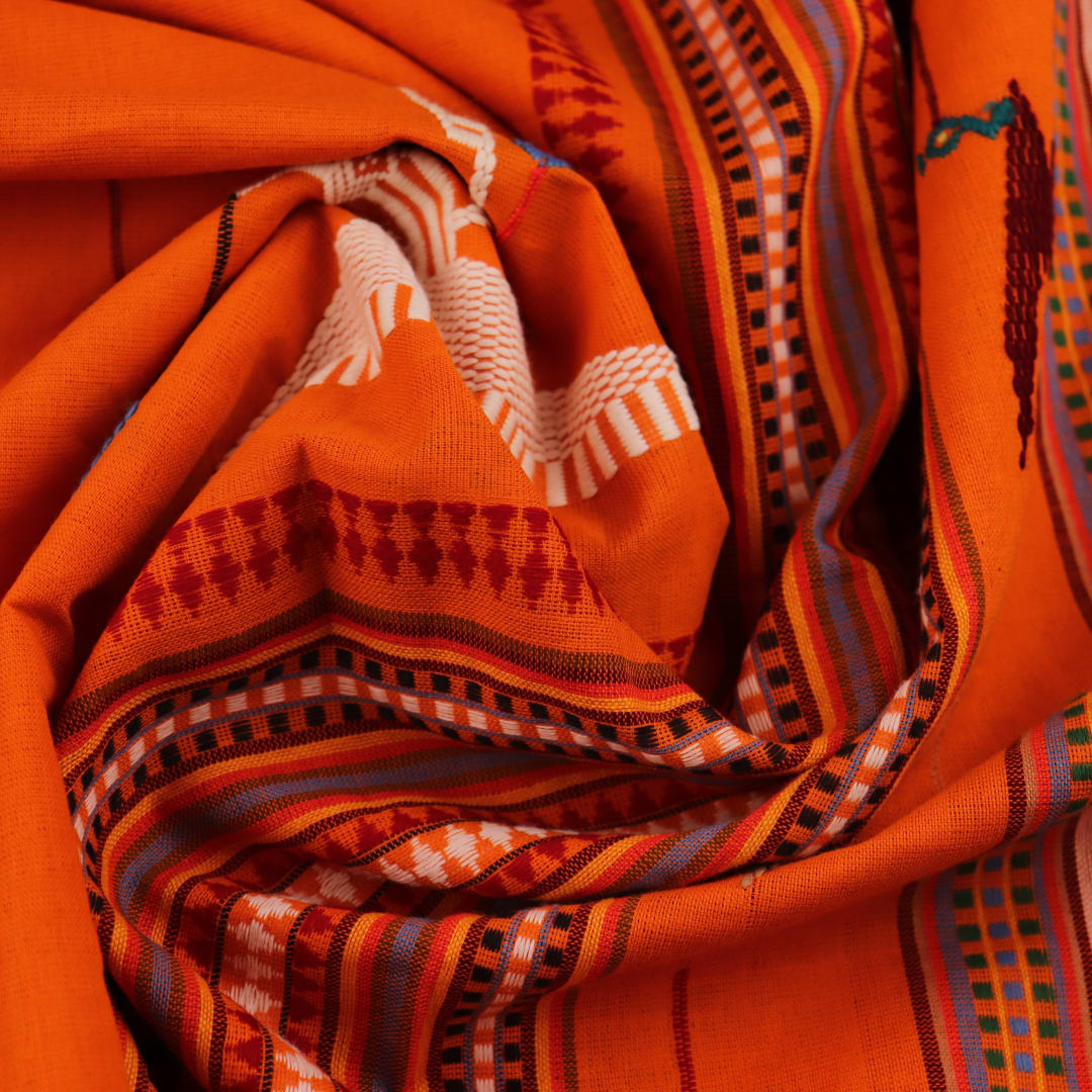 Full-length view of an orange cotton Berhampuri saree with a butta pattern and broad orange borders.