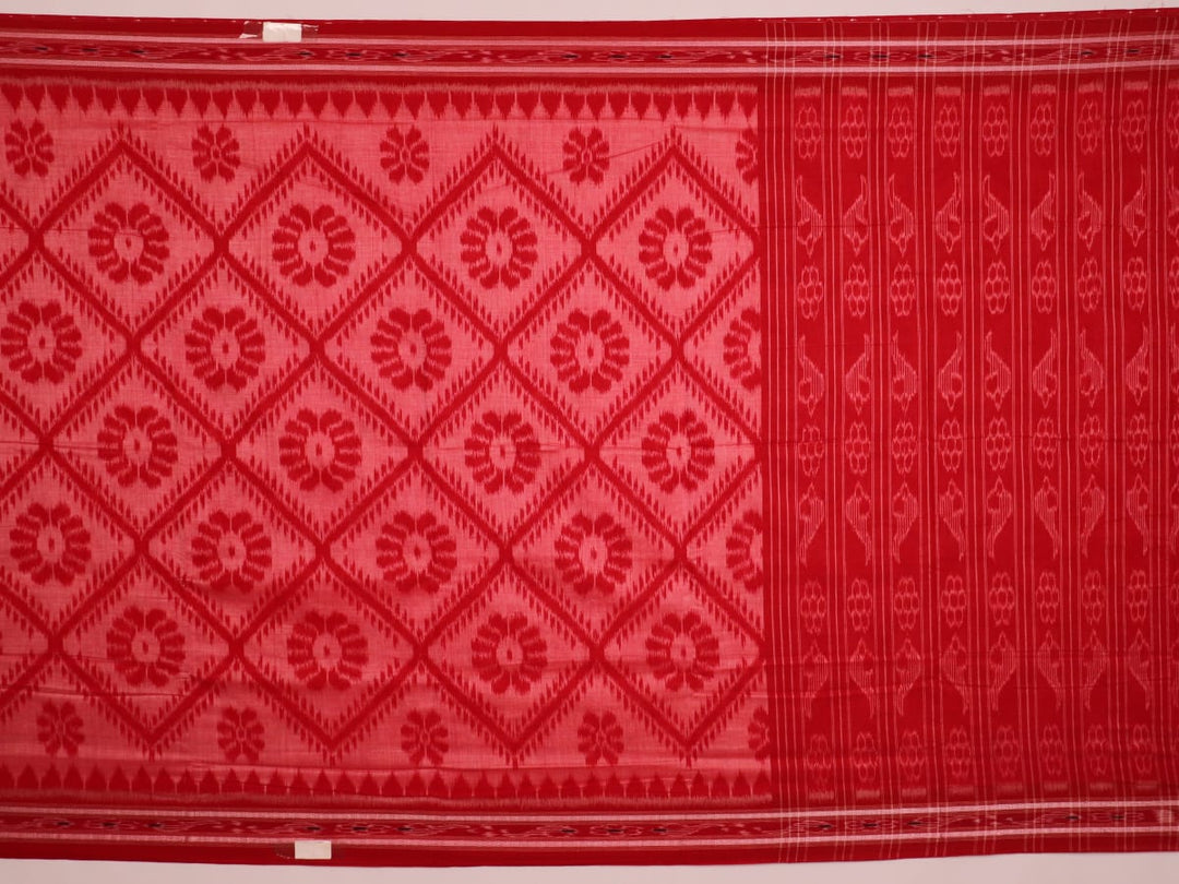 Red and green cotton Sambalpuri saree with traditional motifs draped on a model