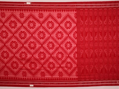 Red and green cotton Sambalpuri saree with traditional motifs draped on a model