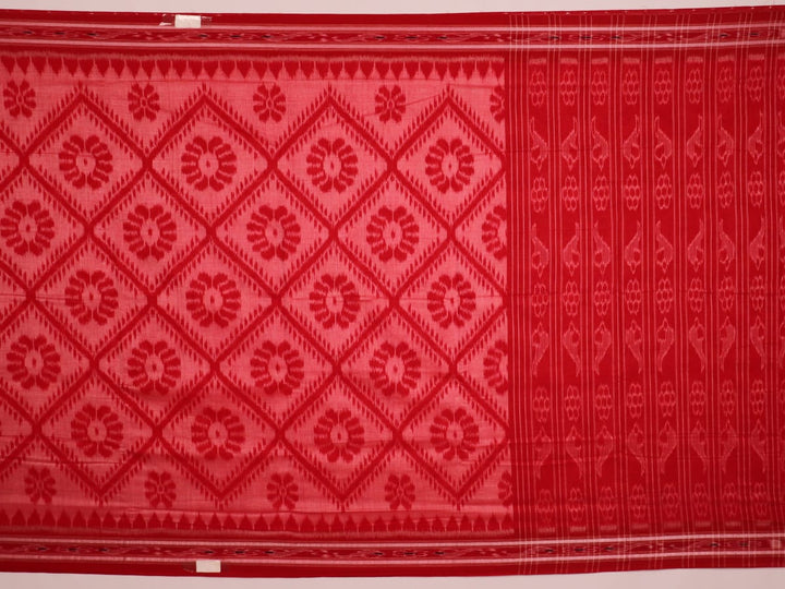 Red and green cotton Sambalpuri saree with traditional motifs draped on a model