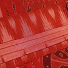 Styling view of a plain multi-color & rust Sambalpuri cotton saree.