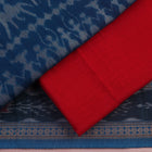 Close-up of the blue and red Sambalpuri cotton dress material's blouse piece with motifs.