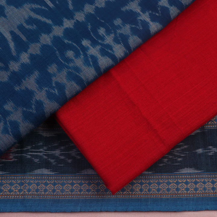 Close-up of the blue and red Sambalpuri cotton dress material's blouse piece with motifs.