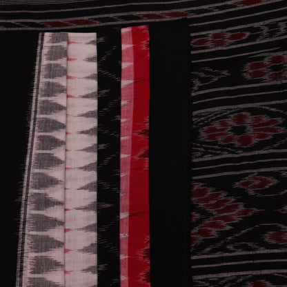Saree styling: A red and black Sambalpuri cotton handloom saree with motifs is beautifully draped.