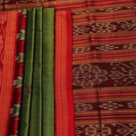 Green Khandua silk saree draped, showcasing its butta pattern and red accents.