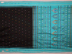 Close-up view of intricate butta pattern on the silk fabric of the black Dolabedi saree
