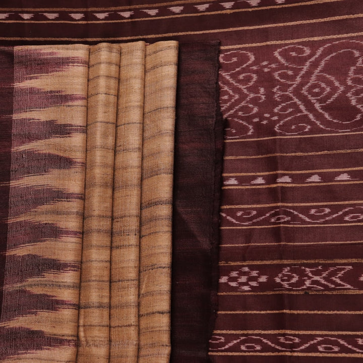 Close-up view of the textured Tussar Silk fabric of a Cream and Maroon Plain Tussar Saree