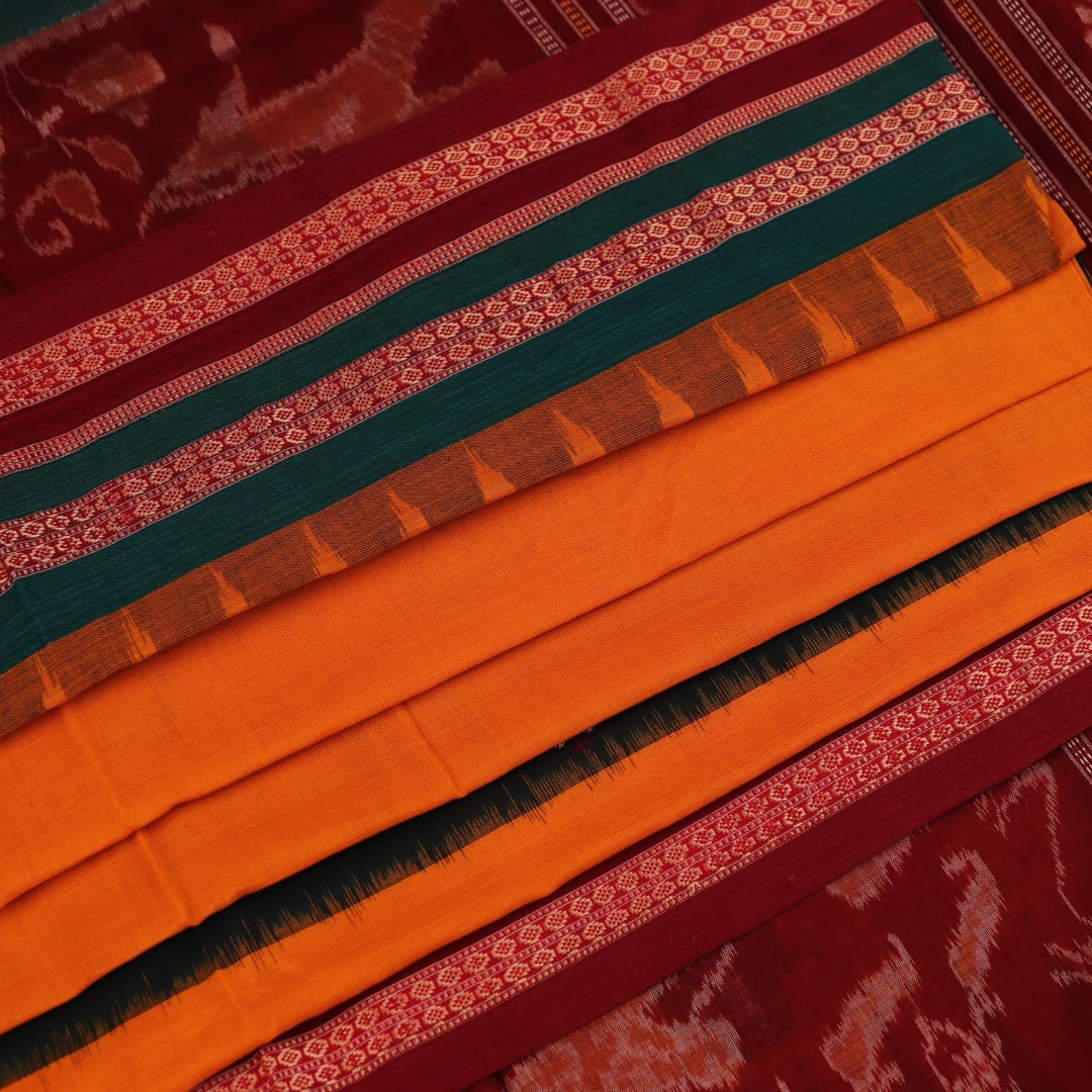 Full view of a yellow Bomkai cotton saree with maroon butta patterns