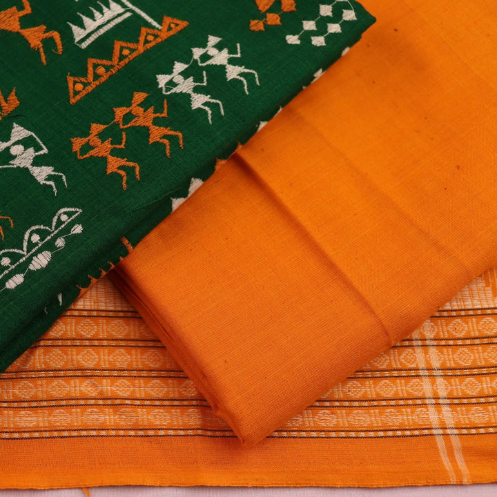 Close-up of green Sambalpuri handloom dress material with a yellow doll pattern