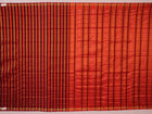 Close-up of multi-color striped Sambalpuri Silk Saree fabric texture.