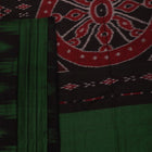 Green and black plain Sambalpuri cotton saree gracefully draped on a model, highlighting its elegant styling.