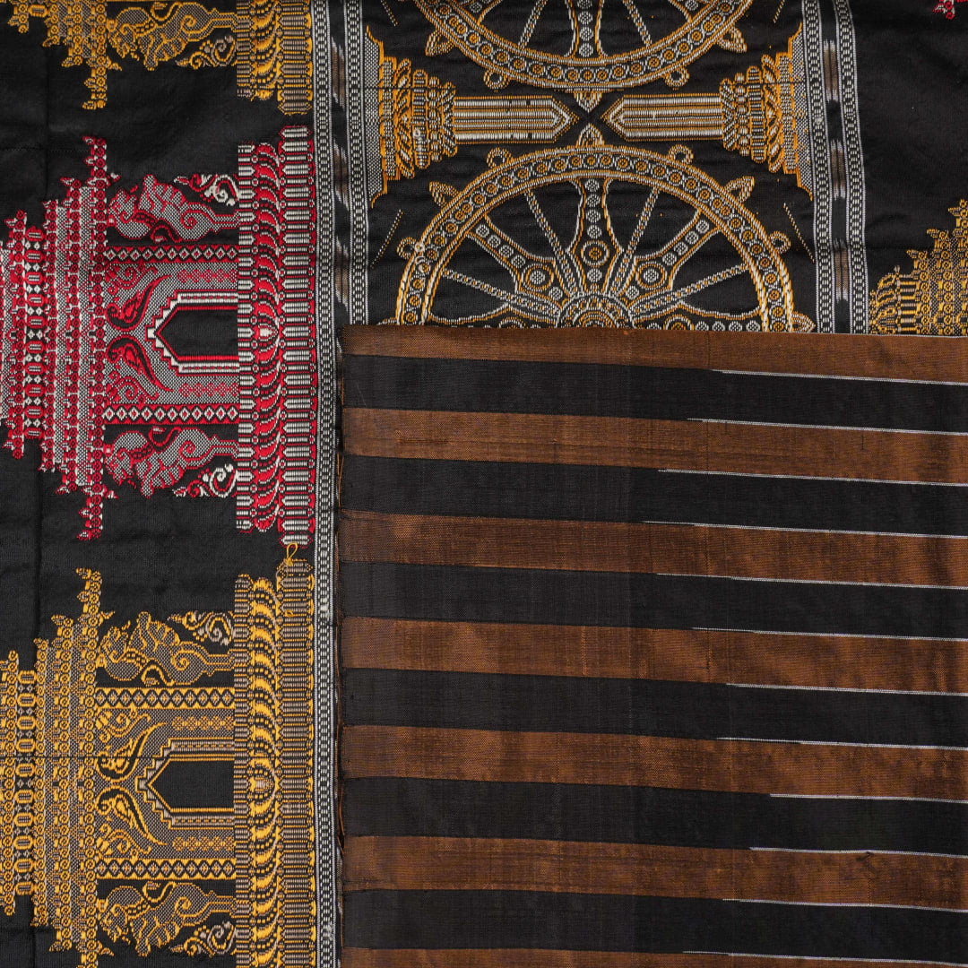 Extreme close-up of brown Bomkai silk saree fabric, revealing rich weave texture and luxurious feel.
