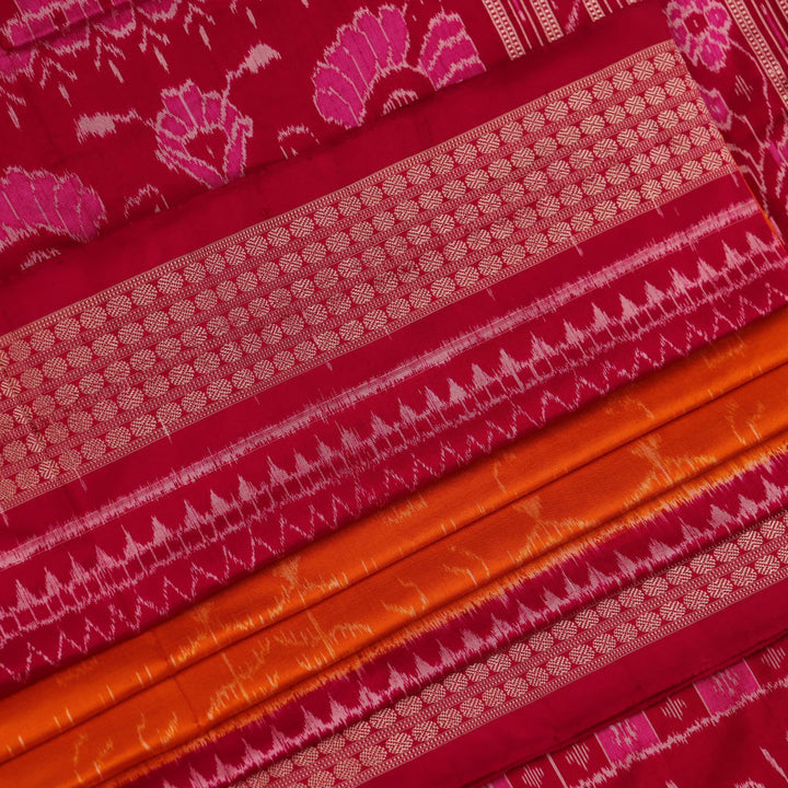 Close-up of intricate sambalpuri silk saree's yellow fabric featuring detailed motifs in rani color