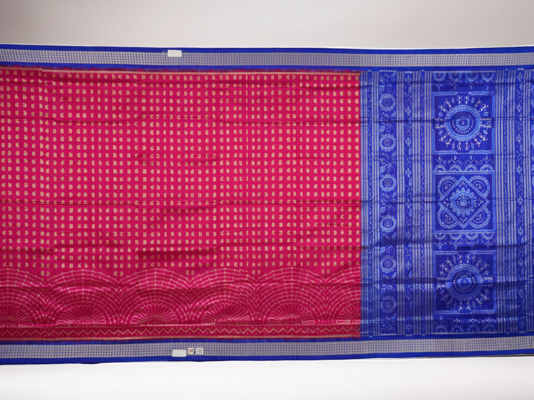 Close-up of Sambalpuri silk fabric texture, revealing the fine handloom weave and quality.