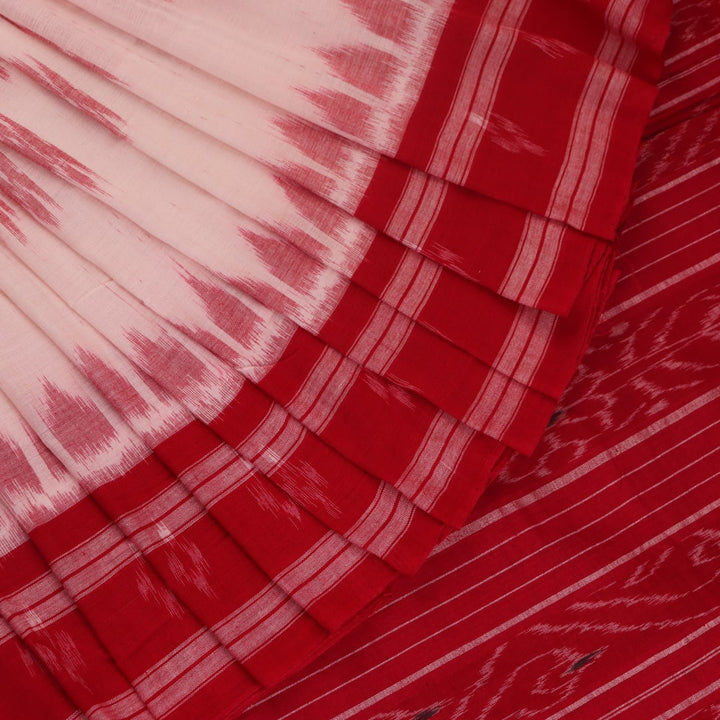 White and red cotton Sambalpuri Saree with motifs, elegantly draped.