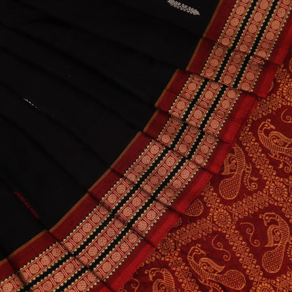 Full view of a black cotton Bomkai saree with rust-colored butta patterns and pallu.