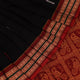Full view of a black cotton Bomkai saree with rust-colored butta patterns and pallu.