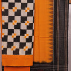 Detail of the white and yellow Sambalpuri cotton dress material blouse piece, showing motifs.