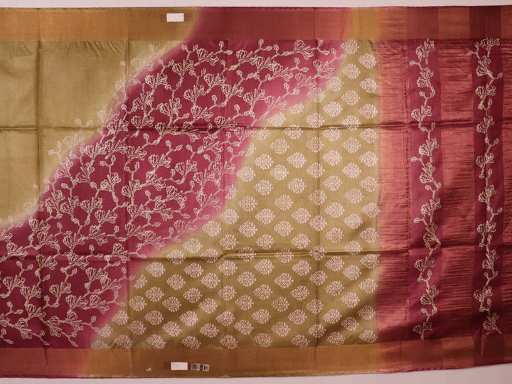 Close-up of the distinctive slub texture of a multi-color printed Tussar Silk saree.