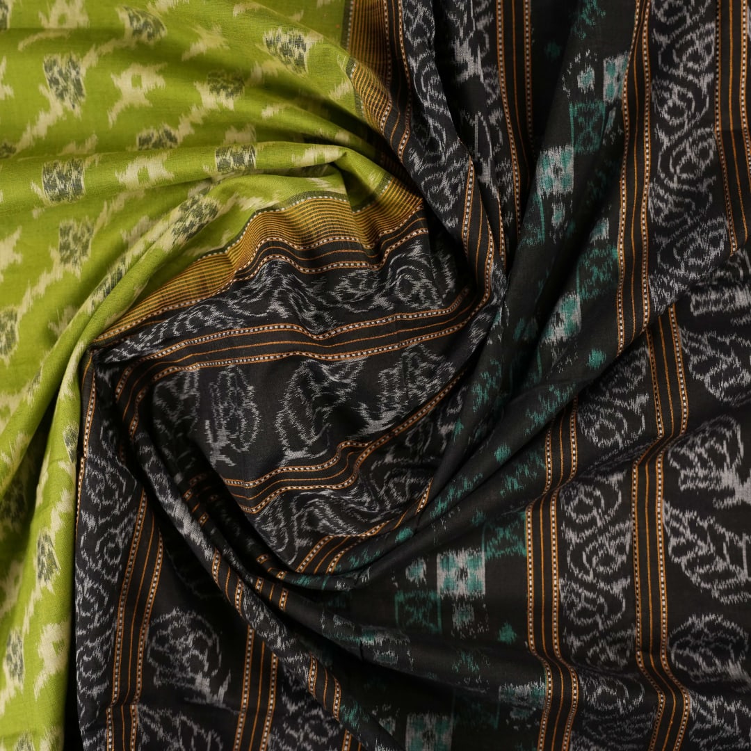 Full flat layout of the green and black Sambalpuri cotton saree with detailed motifs and pallu design