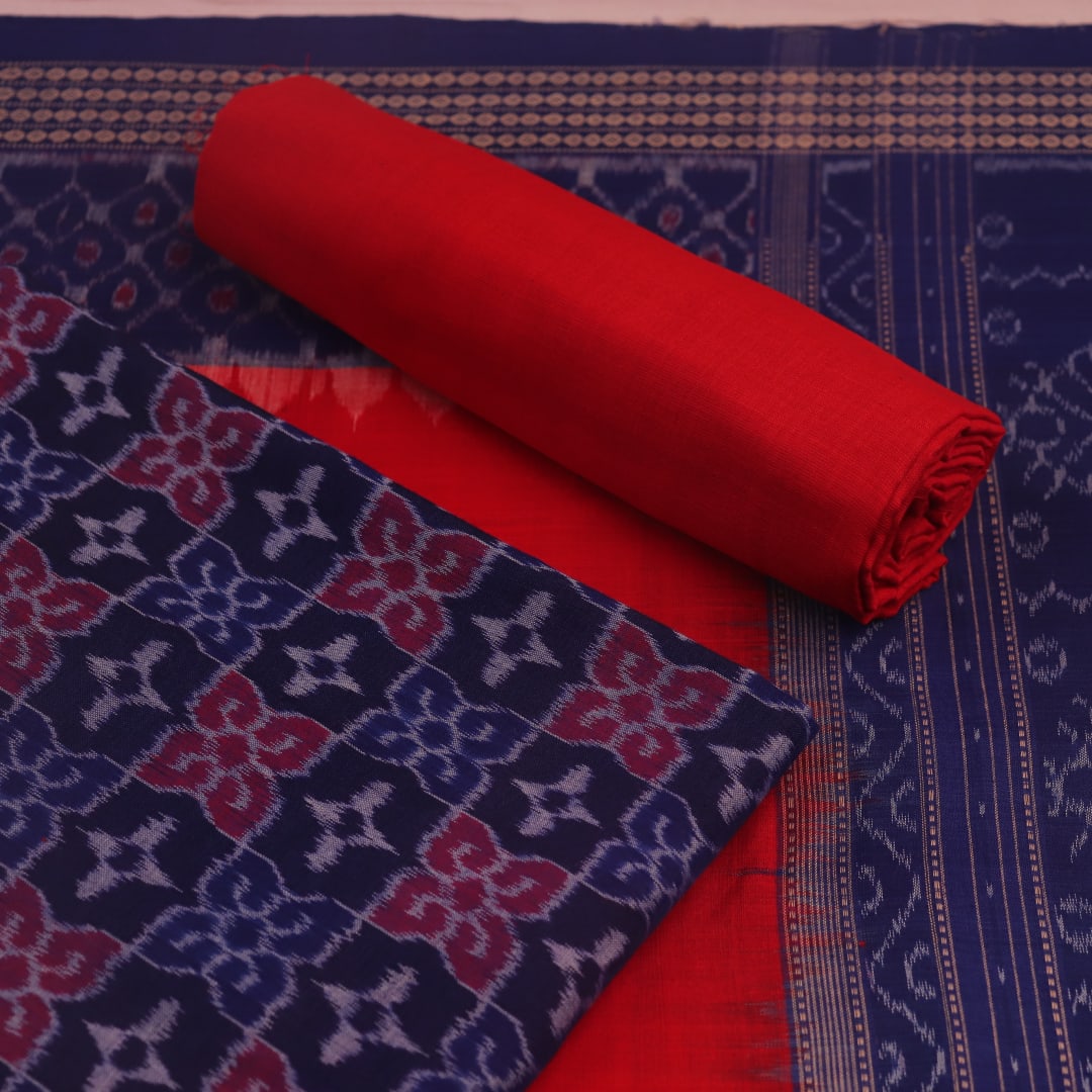 Detail of Sambalpuri blue and red cotton dress material blouse piece, featuring motifs.