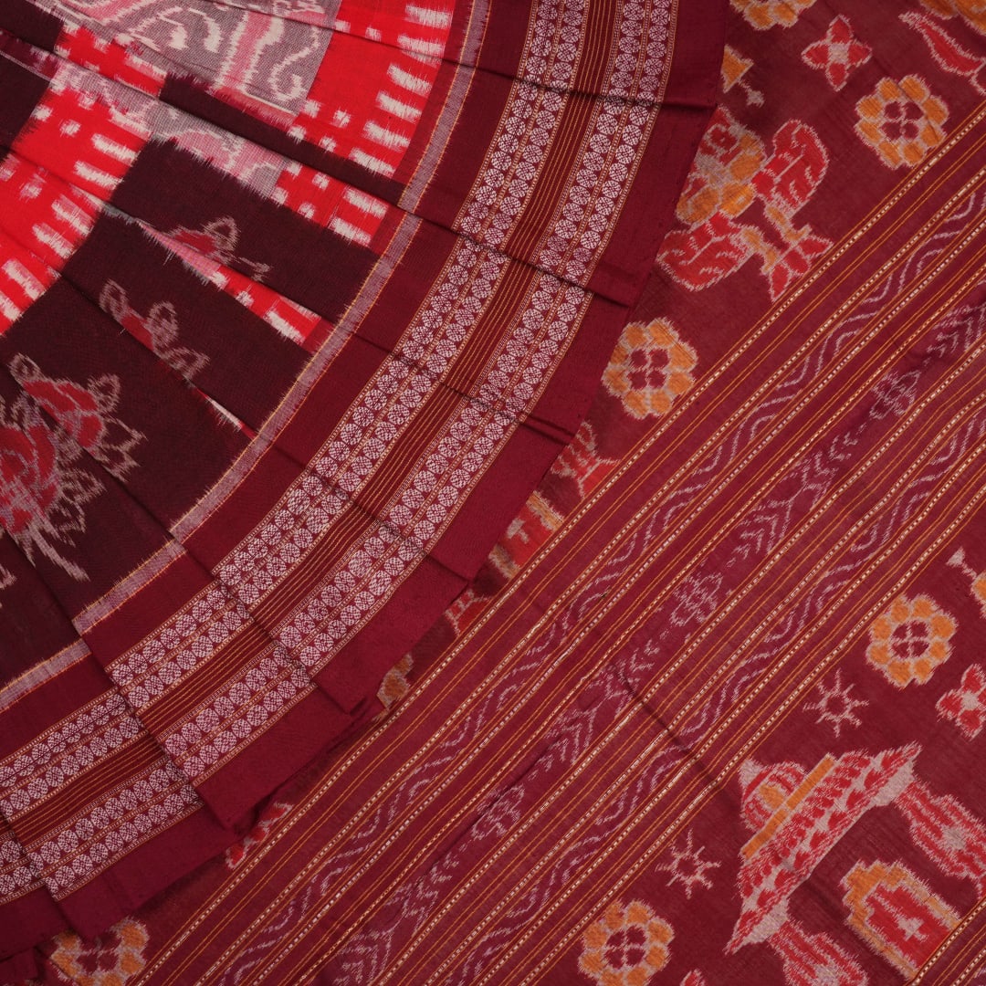 Model wearing a multi-color and maroon Sambalpuri cotton saree in a traditional Pasapalli weave