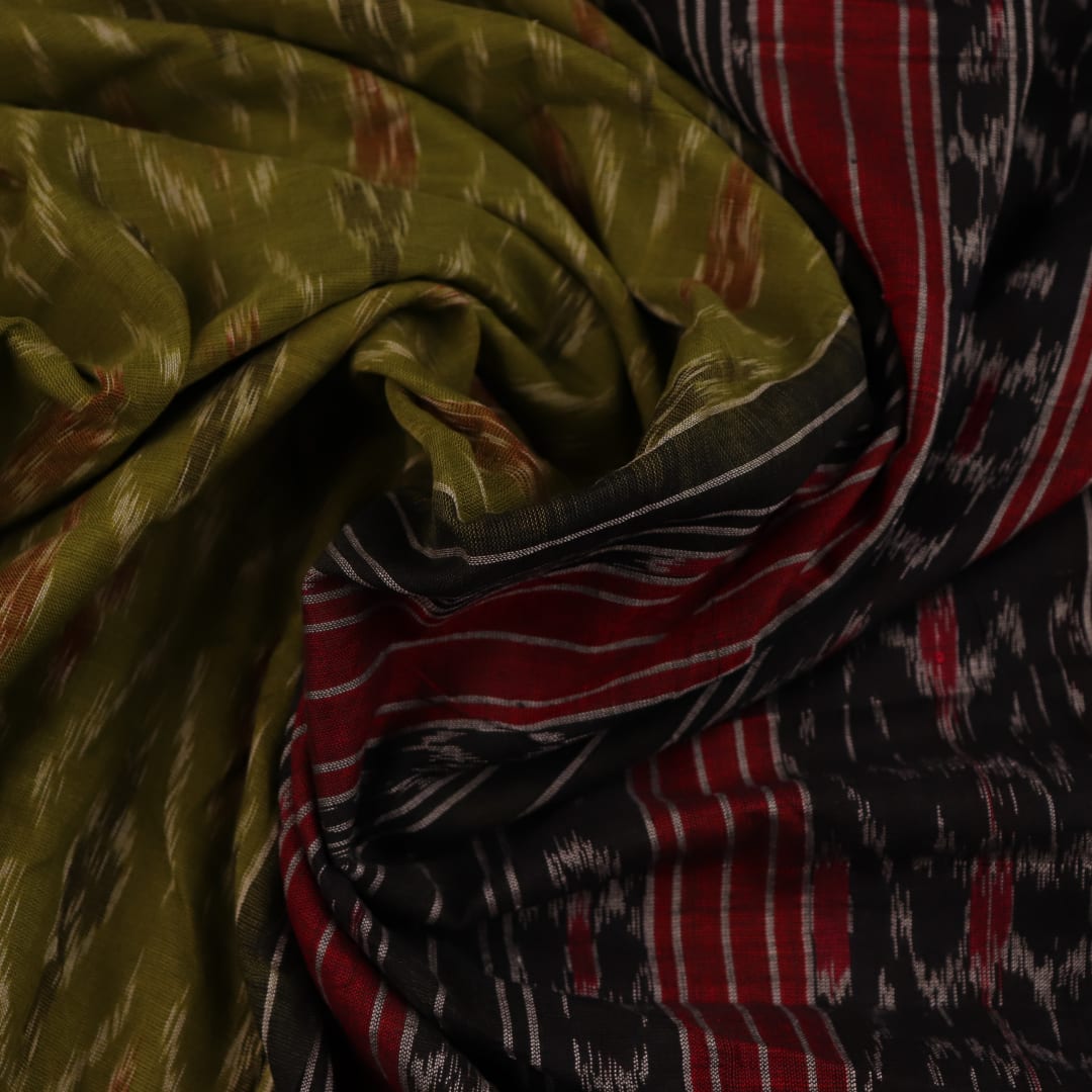 Styling view of a green Sambalpuri cotton saree with black motifs