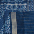 Close-up of premium fabric texture and handloom weave on a white and blue Sambalpuri silk saree