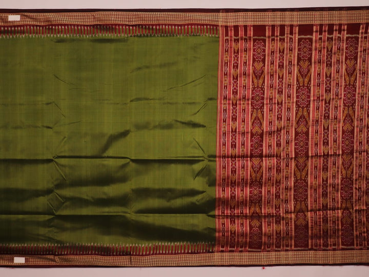 Styling view of vibrant green Khandua silk saree with maroon butta pattern