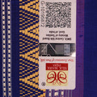 Close-up of pink and blue Dongria Silk Saree fabric texture with butta pattern.