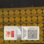 Close-up of the black Sambalpuri silk saree fabric, revealing its rich texture and the intricate weave of the motifs.