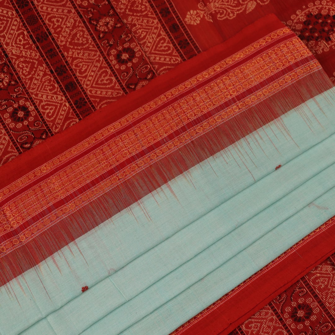 Full view of a handloom green and rust Bomkai cotton saree with butta pattern.