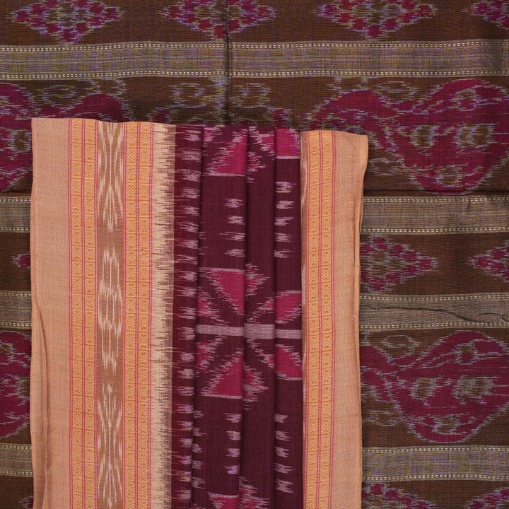 Model wearing an elegantly draped maroon and brown Sambalpuri cotton saree with traditional ikat motifs.