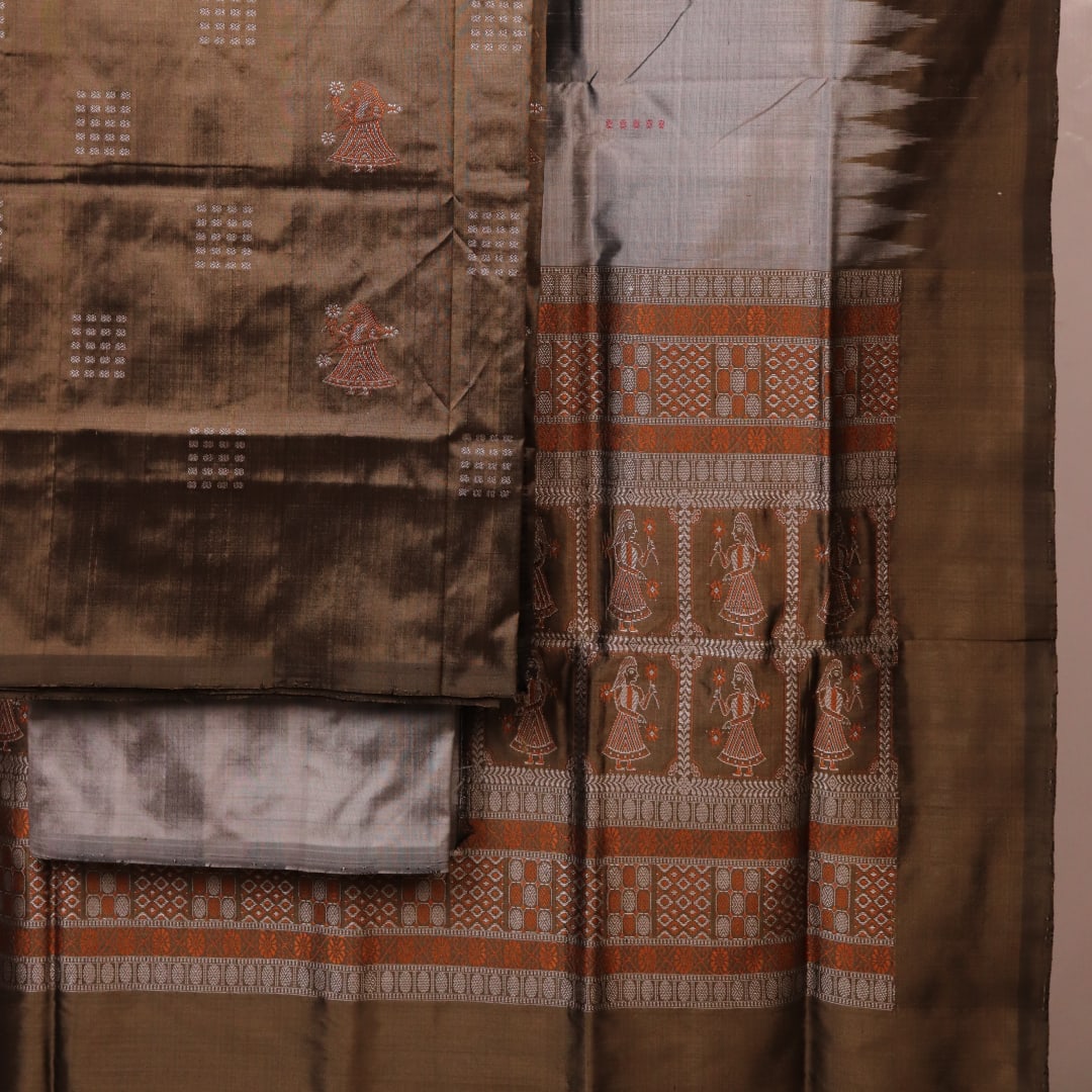 Detail of grey Bomkai silk blouse piece with butta pattern for dress material.