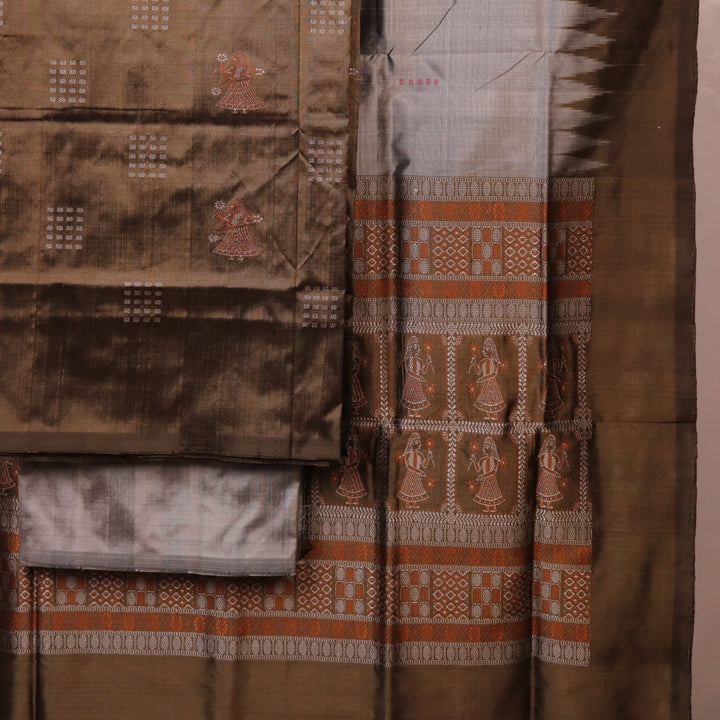 Detail of grey Bomkai silk blouse piece with butta pattern for dress material.