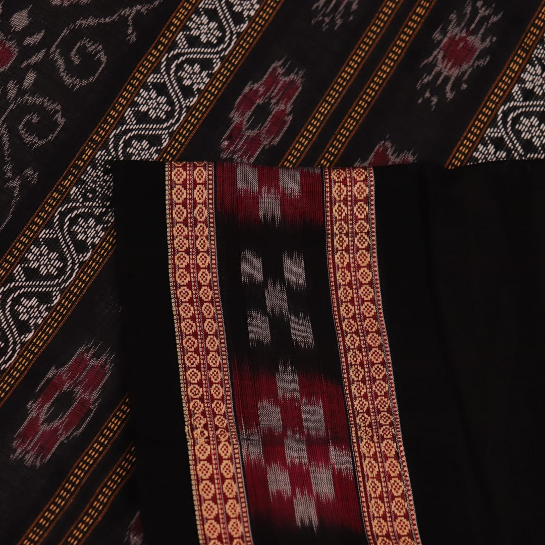 Full view of a grey cotton Sambalpuri saree with black butta pattern