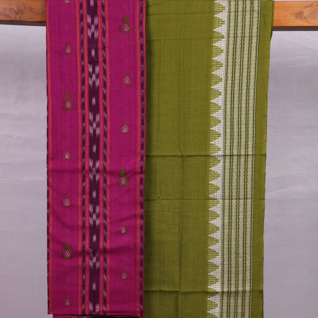 Close-up of blouse piece in magenta cotton with green Sambalpuri motifs