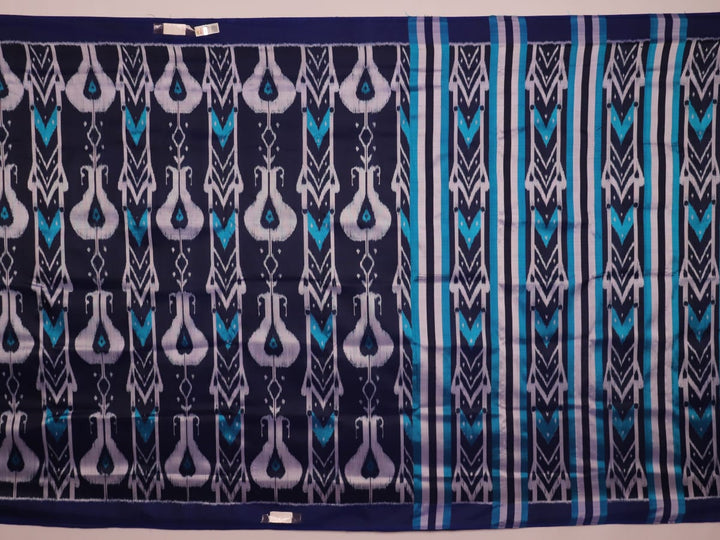 Royal blue Khandua silk saree with intricate motifs, draped elegantly for styling inspiration