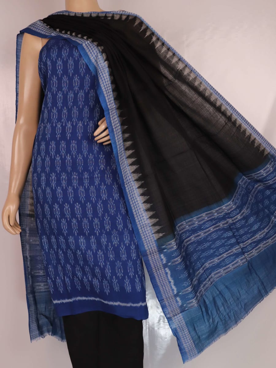 Close-up of Sambalpuri cotton dress material's blue and black body with intricate motifs