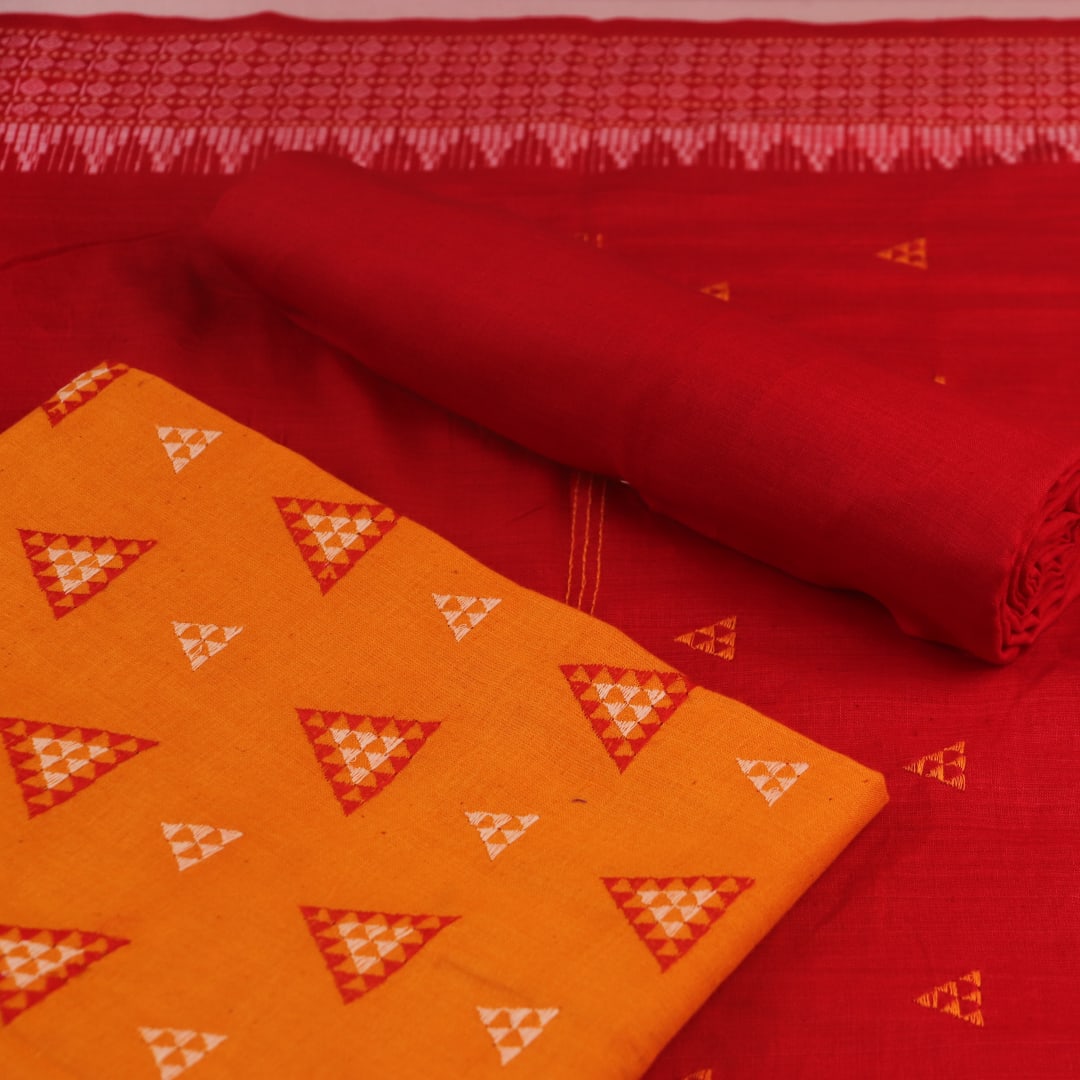 Close-up of the yellow and red Sambalpuri cotton dress material blouse piece with motifs.