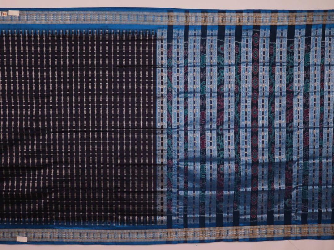 Close-up of handwoven Sambalpuri black silk saree fabric with intricate butta pattern